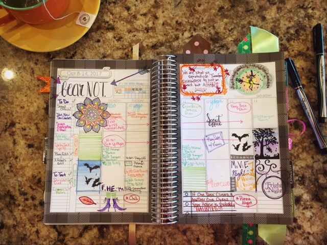 cute October planner filled out with Halloween stickers, witch and bat drawings Mormon Mom Planner