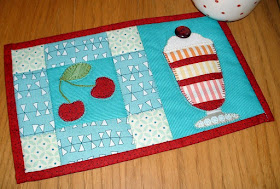 http://www.craftsy.com/pattern/quilting/home-decor/ice-cream-sundae-mug-rug/55562