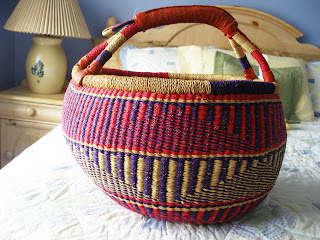 red and blue woven basket from Ghana