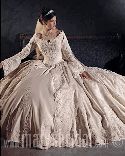 An old era, vintage, long sleeve lace ballgown wedding dress.