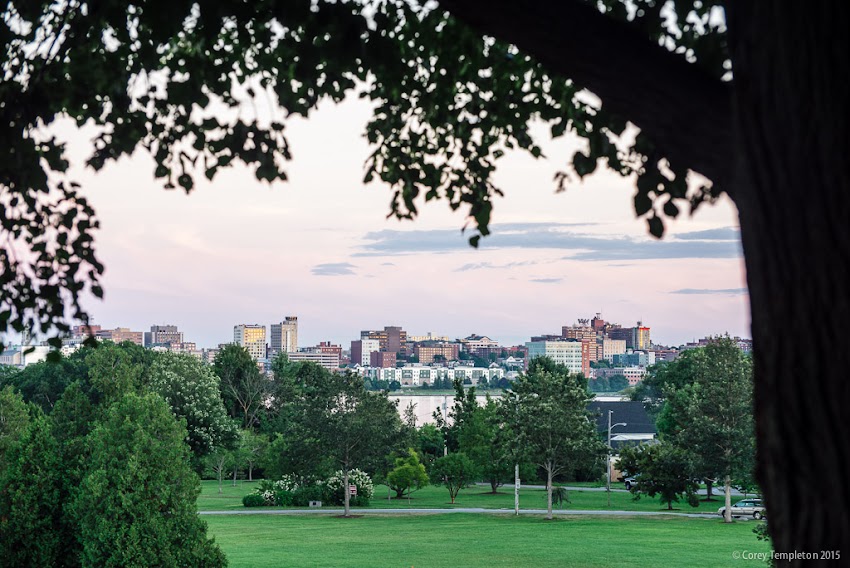 August 2015 Portland, Maine USA From the Ocean Avenue side of Payson Park, looking back towards the skyline of the Portland peninsula. Photo by Corey Templeton.