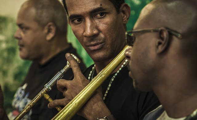 Cuban musicians looking at each other during a rehearsal in Havana, Cuba