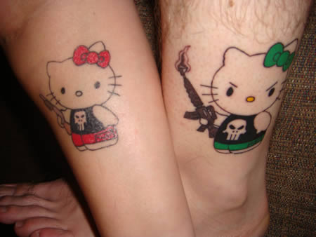 Matching pair of Hello Kitty Punisher tattoos