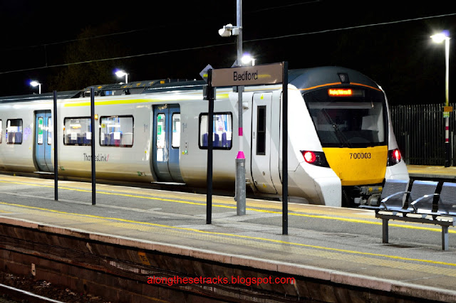 Night photo of Thameslink Trains Class 700003 Desiro City EMU train stands in Bedford station prior to travelling south 2018