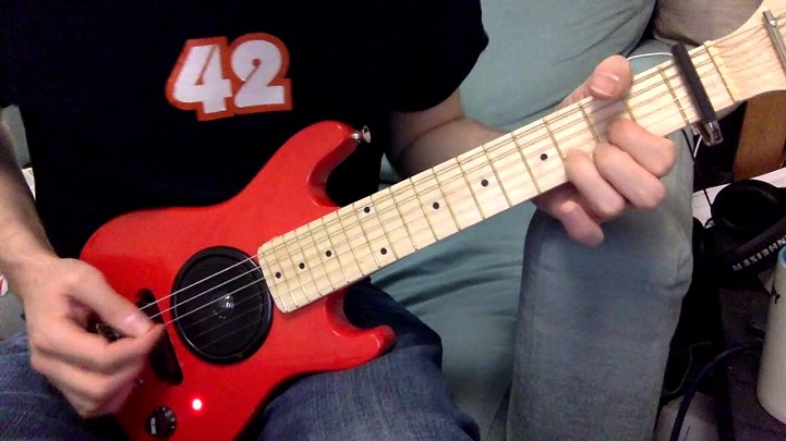 child's red guitar