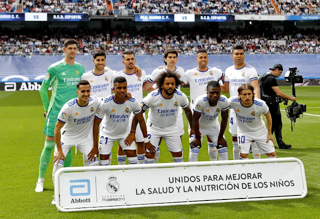 REAL MADRID C. F. Temporada 2021-22. Courtois, Marco Asensio, Dani Ceballos, Vallejo, Mariano y Casemiro. Lucas Vázquez, Rodrygo, Marcelo, Camavinga y Modric. REAL MADRID C. F. 4 R. C. D. ESPANYOL DE BARCELONA 0 Sábado 30/04/2022, 16:15 horas. Campeonato de Liga de 1ª División, jornada 34. Madrid, estadio Santiago Bernabéu: 58.686 espectadores. GOLES: 1-0: 33’, Rodrygo. 2-0: 43’, Rodrygo. 3-0: 55’, Marco Asensio. 4-0: 81’: Karim Benzema.