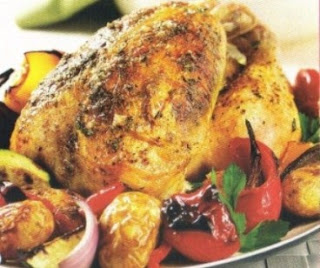 Picture of Herb-Roasted Chicken with potatoes and bell pepper