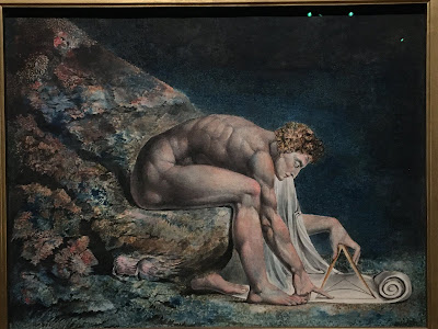 Blake painting of a naked man using a pair of compasses on a scroll