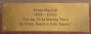 photograph of memorial plaque from a park bench