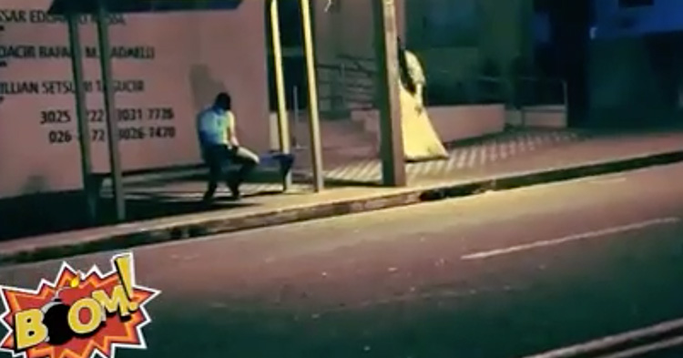 A man was waiting for a bus when the prank happened.