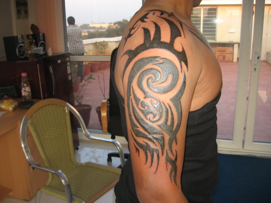 Tribal Half Sleeve Tattoos Half arm tattoo designs can refrain you get