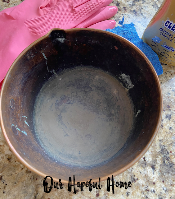 dirty inside of copper sauce pot