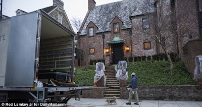 Moving vans seen arriving at $4.3m DC mansion where the Obama family will live 