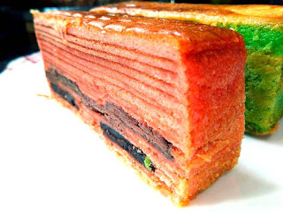 Pink kueh lapis - probably strawberry - with layers of milk and dark chocolate fudge.