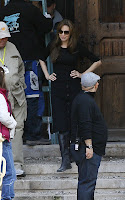 Angelina Jolie kissing Brad Pitt and working on her movie in Budapest
