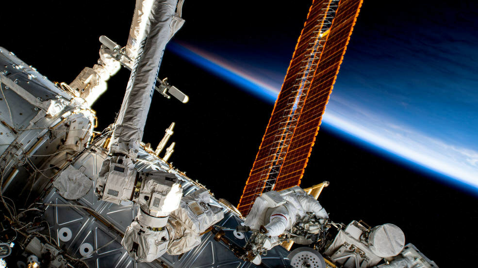 iMAGE OF NASA astronaut and Expedition 69 Flight Engineer Steve Bowen is pictured outside the International Space Station during his eighth career spacewalk, during which he routed cables and installed insulation to ready the orbital outpost for its next set of roll-out solar arrays.