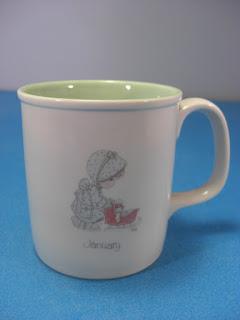 http://bargaincart.ecrater.com/p/16350656/january-birthday-mug-precious-moments?keywords=january