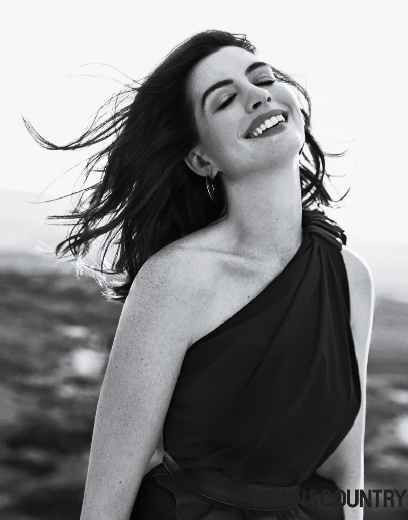 Anne Hathaway wears Max Mara dress and Vhernier earrings