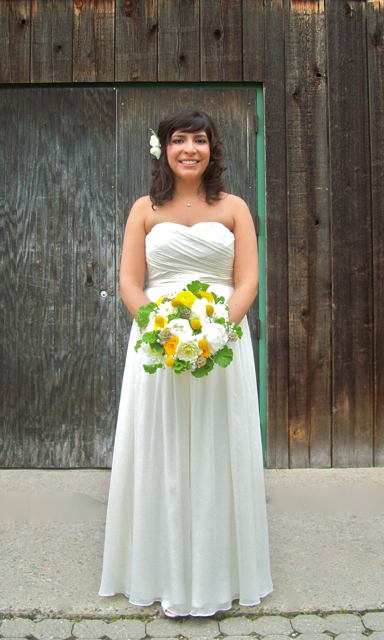 Corsages were composed of white ranunculus as was a small comb for Jessi's