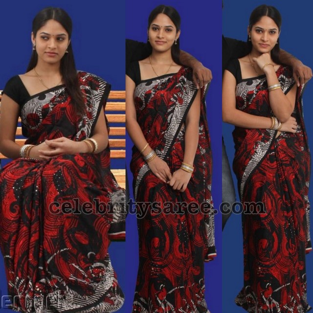 http://www.celebritysaree.com/2011/05/kajal-agarwal-in-banarasi-georgette.html