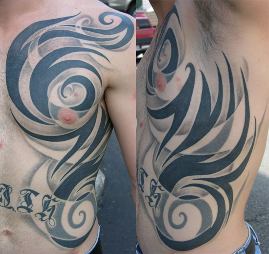 cross tattoos for men on ribs Rib Cage Tribal Tattoos for Men