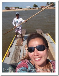 Boatman rowing us across river