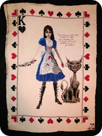 An A4 cross-stitch of Alice and the Cheshire cat from the game "Alice: Madness Returns"