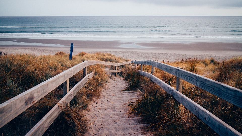 Small bridge and a beautiful view of the beach