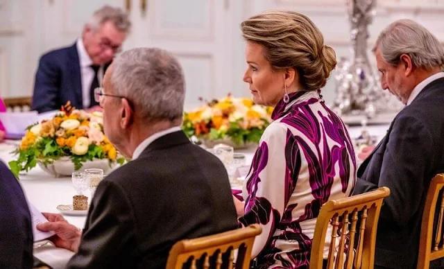 Queen Mathilde wore floral print long sleeve silk dress by Dries van Noten. President Alexander Van der Bellen and Doris Schmidauer