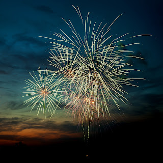 Bright Fireworks in the Night Sky