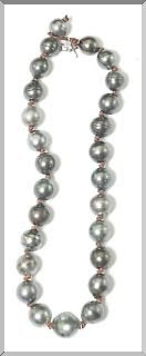 Black tahitian Pearls on knotted leather