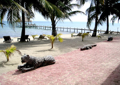 Carved wood jaguar and alligator, Belize