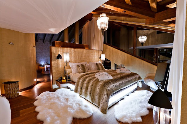 Picture of luxury bedroom with white carpets at night