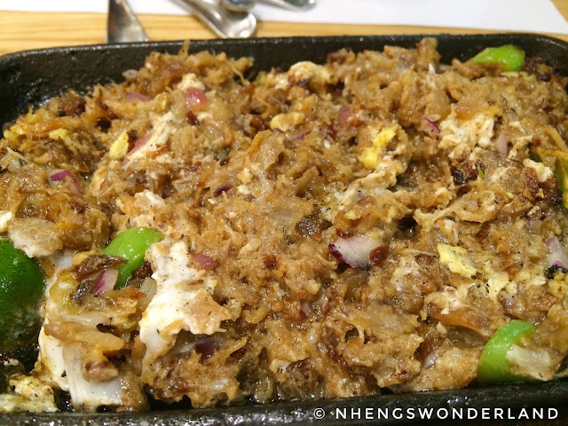 Kuya J Restaurant - Sizzling Sisig w/ Egg