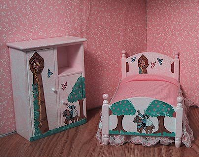 miniature dresser with picture of Rapunzel; also a miniature bed
