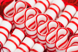 red and white christmas ribbon candy wallpaper