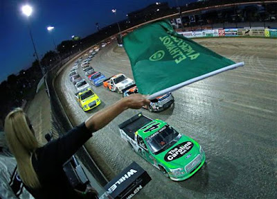 Ben Rhodes, driver of the #41 The Carolina Nut Co. Ford, takes the green flag to start the NASCAR Camping World Truck Series Eldora Dirt Derby at Eldora Speedway on July 18, 2018 in Rossburg, Ohio. 