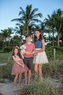 Florida family on the beach with dog