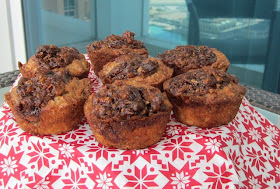 Food Lust People Love: Banana muffins filled and topped with a bananas Foster sauce of brown sugar, rum and pecans! These Bananas Foster Muffins are a decadent breakfast or a handheld dessert!