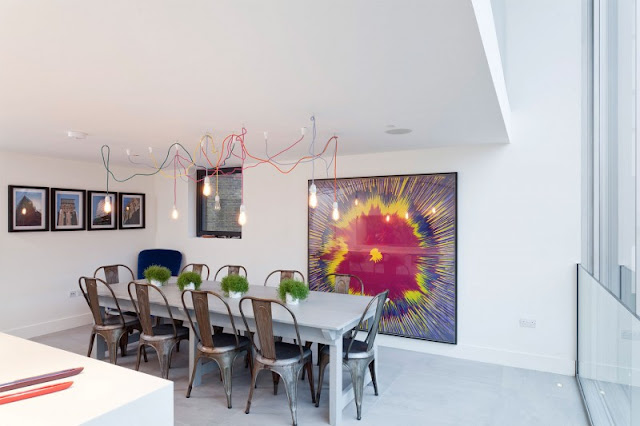 Picture of dining table in the dining room with white walls