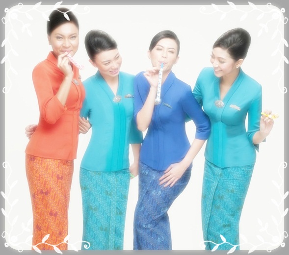 Contoh model seragam pramugari maskapai airlines Indonesia