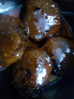 Gokul Pithe, Fried dumplings soaked in thick sugar syrup, Bengali traditional Bengali Pithe, pithe