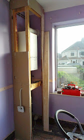 Cupboard housing boiler