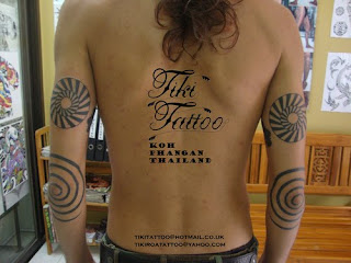 word tattoos on side