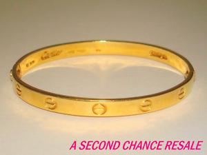 classic cartier 18k yellow gold love bracelet is a must for jewelry ...