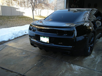 Sick black camaro with black tail lights