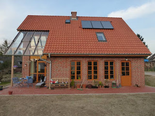 einfamilienhaus mit überdachter terrasse 