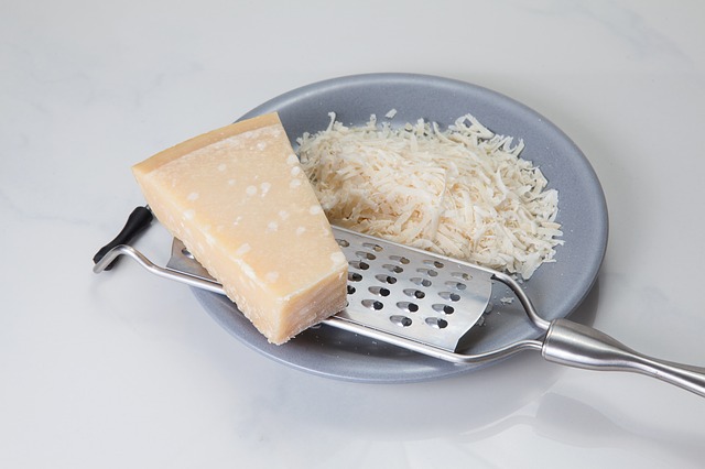 Grated Parmesan Cheese, Grater, and Un-grated Parmesan