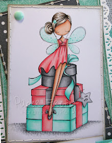 Stepper card featuring fairy with a pile of presents (image from ADU)