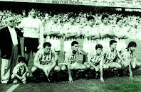 REAL BETIS BALOMPIÉ - Sevilla, España - Temporada 1989-90 - Trujillo, Miguel Ángel I, Miguel Ángel II, Monsalvete, Chano y Rubén Bilbao; Mel, Ureña, León, Recha y Puma Rodríguez - R. C. D. ESPAÑOL DE BARCELONA 2 (León (p.p.) y Wuttke), REAL BETIS BALOMPIÉ 2 (Monsalvete y Pepe Mel) - 13/05/1990 - Liga de 2ª División, jornada 36 - Barcelona, estadio de Sarriá - El Betis, con Juan Corbacho y Julio Cardeñosa de entrenadores, se clasificó 2º en la Liga, ascendiendo a 1ª División